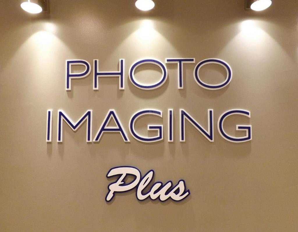 Passport photo kiosk at mall storefront