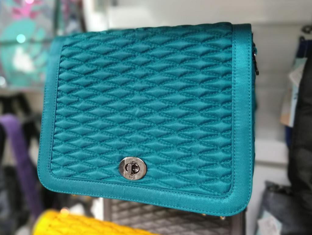 Lug teal quilted crossbody clutch bag
